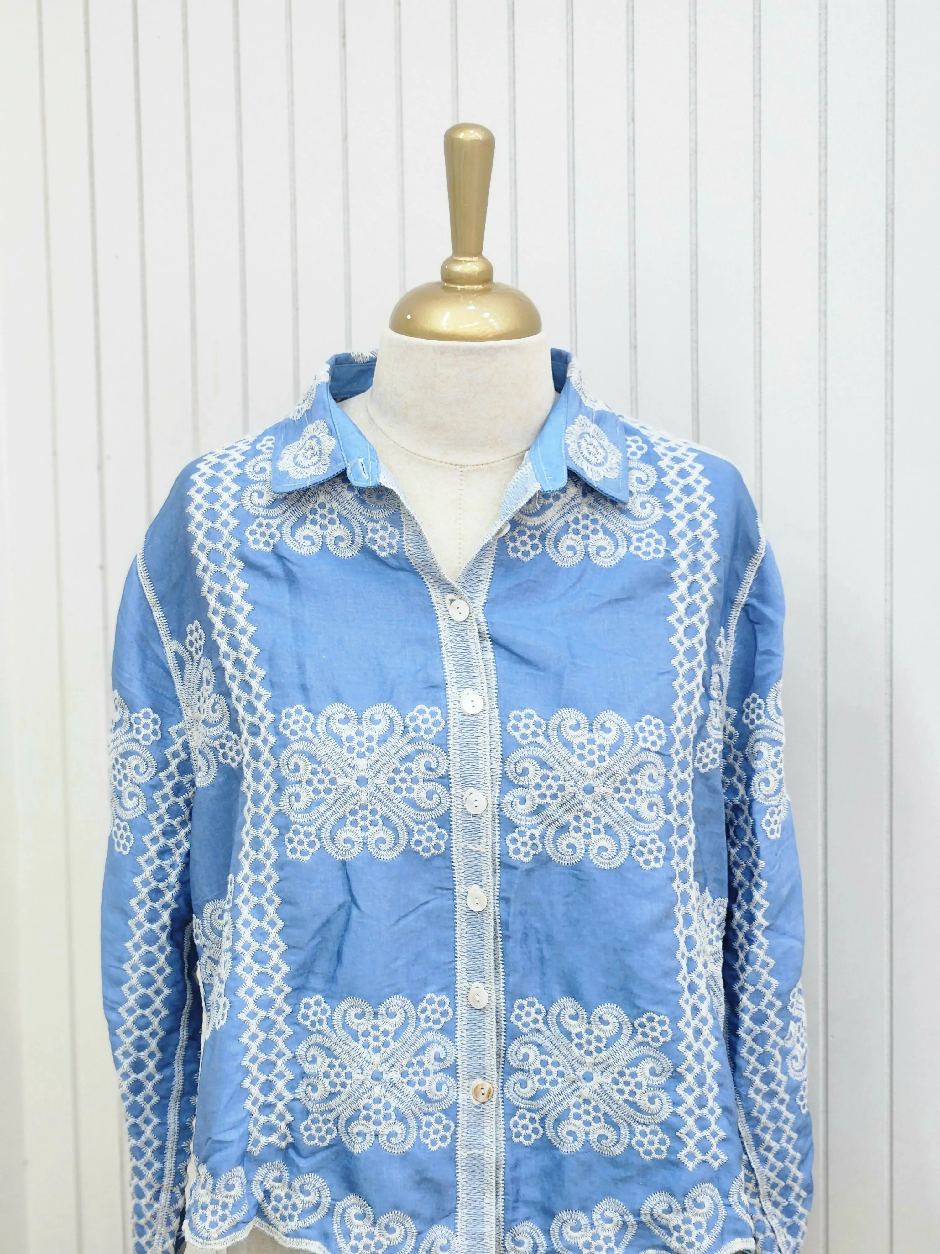 A Light blue thread work short top