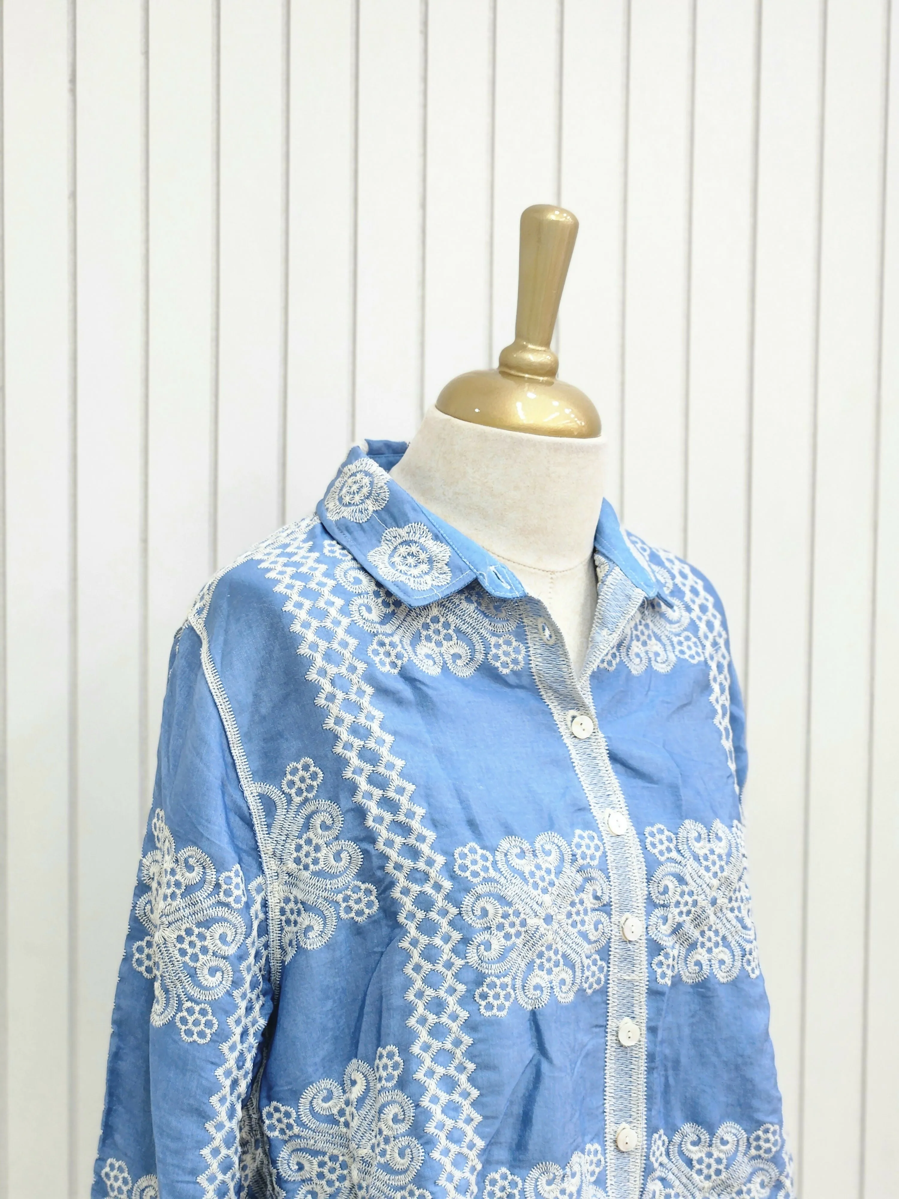 A Light blue thread work short top